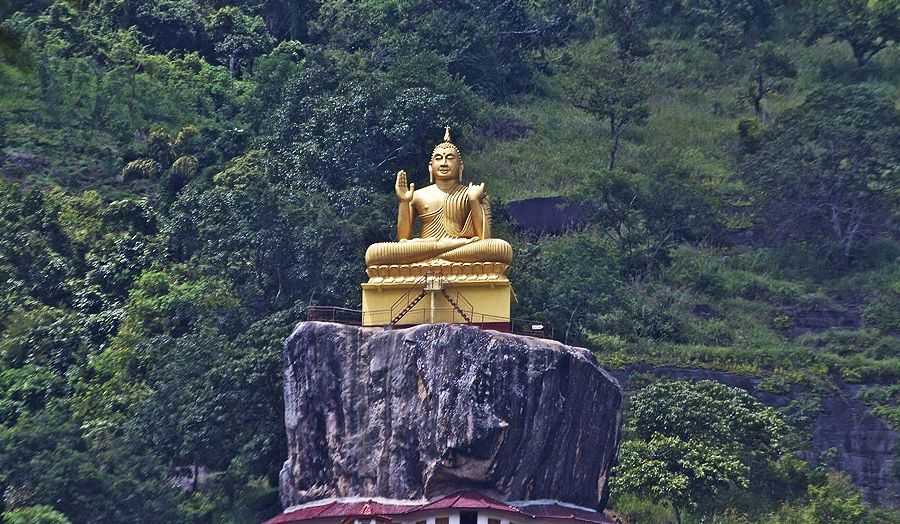 Aluvihare Rock Temple Statue